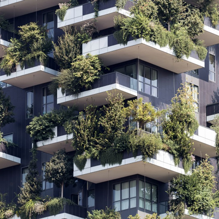 apartment-building-with-plants-on-balcolny