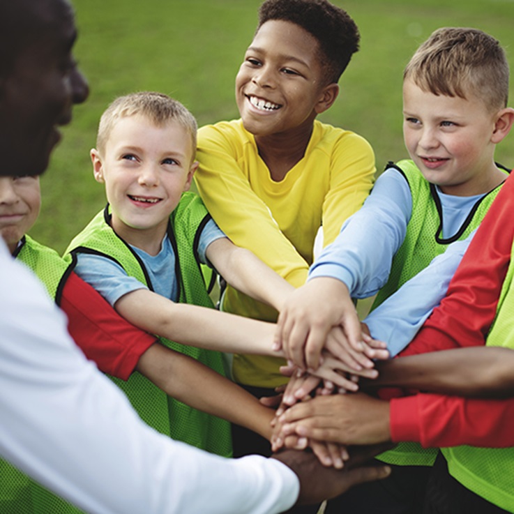 youth-in-soccer-huddle_500x500